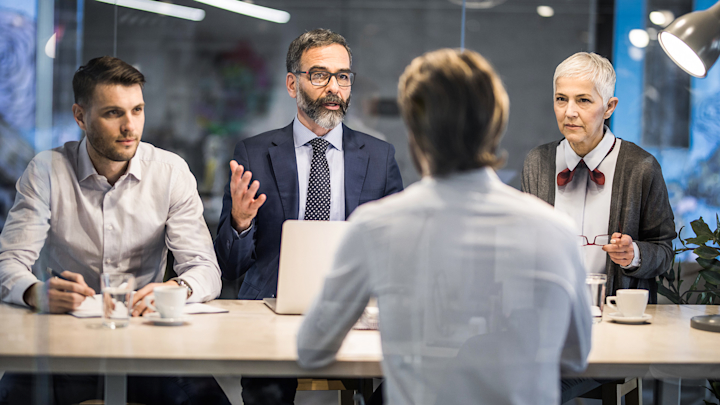 Panel interview with three interviewers